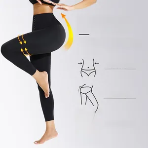 Détail du legging taille haute montrant la boucle de contrôle et le tissu compressif
