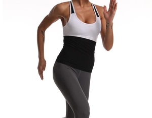 Detail shot of the racerback sports vest and leggings on a model for waist training