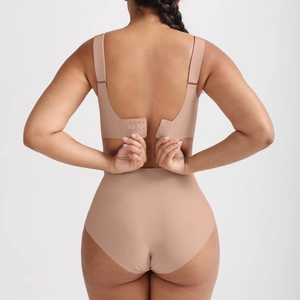 Rear view of nude seamless bra with multi-row back hooks and wide shoulder straps