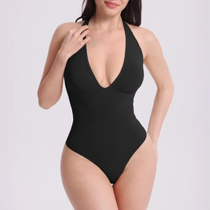 Detailed front view of high-waisted black bodysuit with deep V-neck and halter strap