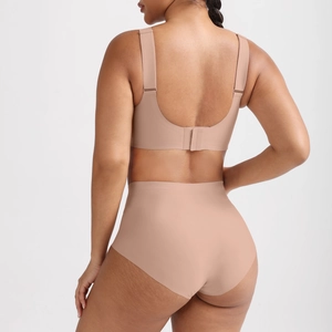 Detail view of seamless nude lingerie set featuring high waist panties and U-back bra
