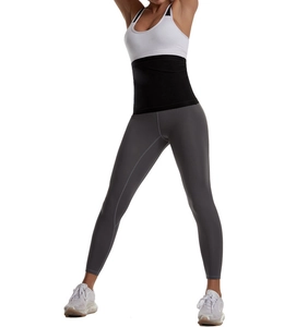 Detail of the high-compression black waist trainer belt with blue film coating for fitness