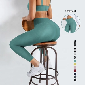 Vue détaillée du legging de yoga vert foncé taille haute avec guide des tailles S-XL