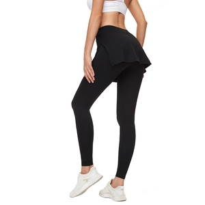 Détail du legging de yoga 2 en 1 noir avec jupe en tissu élastique à séchage rapide