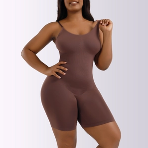 Detail of high-elastic seamless shapewear fabric and tummy control zones on bodysuit