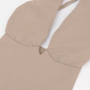 Detail of high-quality khaki halter neck bodysuit with smooth fabric and deep V neckline