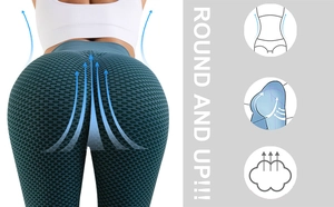 Détail du legging de yoga taille haute vert foncé avec texture nid d'abeille et effet galbant