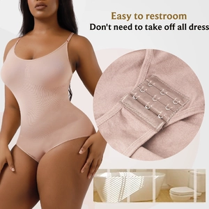 Detail view of crotch hook-and-eye closure for easy restroom use on nude bodysuit