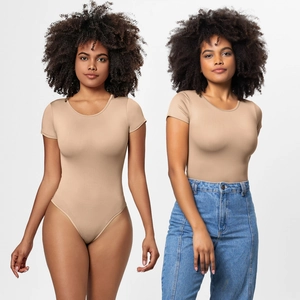 Detail view of a nude short-sleeve bodysuit paired with denim jeans for a casual look