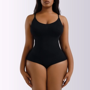 Detail view of seamless black bodysuit showing firm tummy control and body shaping effect