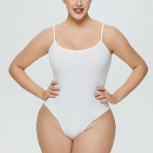 Detail of ribbed texture on white sleeveless bodysuit with slim spaghetti straps