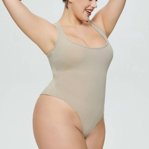 Detail of ribbed khaki bodysuit showing high-cut leg and sleeveless vest design