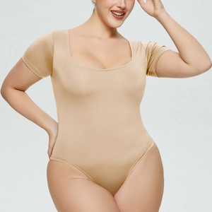 Detail of nude square neck bodysuit featuring stretchy slim fit fabric and short sleeves