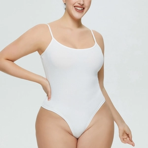 Detailed texture of white ribbed cotton bodysuit with thin straps and scoop neckline