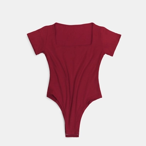 Detailed view of square neck bodysuit in dark red with short sleeves and snap buttons