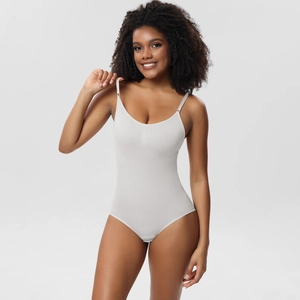 Close-up of seamless light grey bodysuit with thin straps and high-elastic ribbed texture