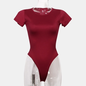 Detailed front view of the burgundy short sleeve bodysuit with a classic round neck