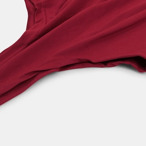 Close-up of dark red square neck bodysuit showing double-needle flat seam stitching