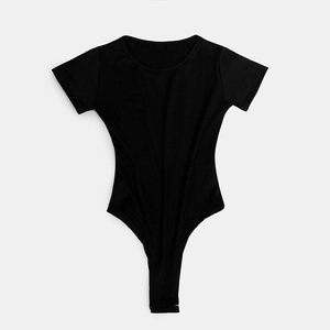 Detailed flat lay of a black short sleeve bodysuit with a round neck and slim fit