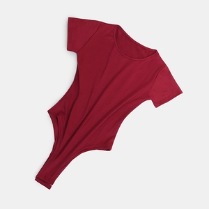 Flat lay detail of a burgundy crew neck short sleeve bodysuit with smooth stitching