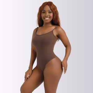 Detailed macro view of the ribbed texture and high elastic brown fabric of the bodysuit
