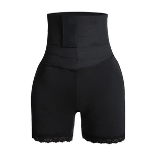 Short gainant taille haute noir avec bande de compression et bordure en dentelle florale
