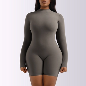Detail of grey long sleeve bodysuit showing high neck and stretch knitted fabric texture