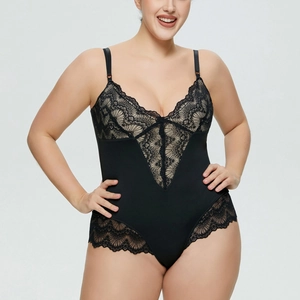 Detailed view of the intricate floral lace embroidery on black deep V-neck bodysuit