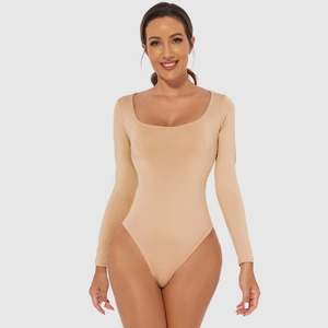 Detailed view of nude square neck bodysuit featuring long sleeves and fitted elastic fabric
