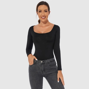 Detail of a black long sleeve bodysuit with square neckline and slim fit fabric