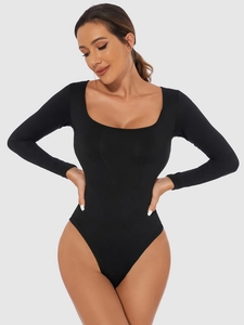 Detail view of black long sleeve bodysuit with scoop neck and elastic knit fabric