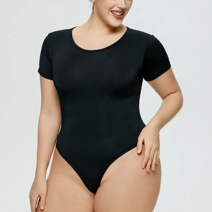 Detailed view of black short sleeve bodysuit with a classic crew neck and slim fit