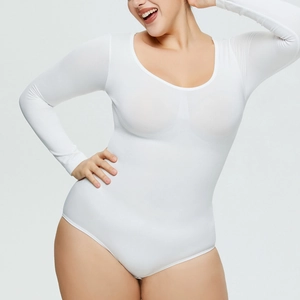 Close-up of white long-sleeve bodysuit featuring elastic fabric and round neckline