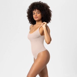 Detail of seamless skin-colored bodysuit showing the fine straps and smooth stretch fabric