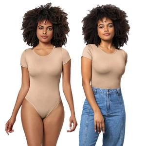 Slim fit nude short sleeve crew neck bodysuit for women shown with denim styling