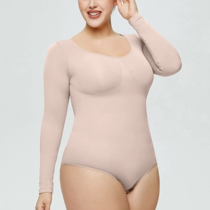 Detail of the seamless round neck long sleeve bodysuit in a stretchy skin tone fabric