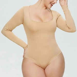 Detail view of skin tone long sleeve bodysuit with square neck and slimming fit fabric