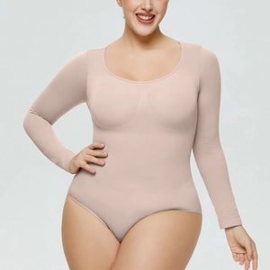 Detail of nude long sleeve shaping bodysuit featuring seamless fabric and round neckline
