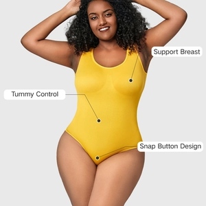 Detail of yellow seamless shapewear with tummy control and snap button closure features