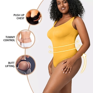 Detail of yellow seamless bodysuit showing push up chest and tummy control zones