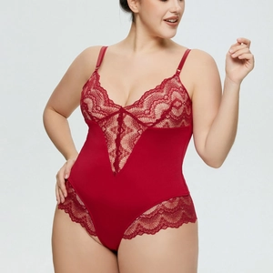 Detailed view of dark red lace trim and deep V-neck on the slim fit bodysuit
