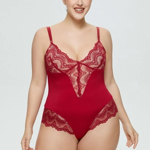 Detailed view of red lace bodysuit showing deep V-neckline and intricate floral embroidery