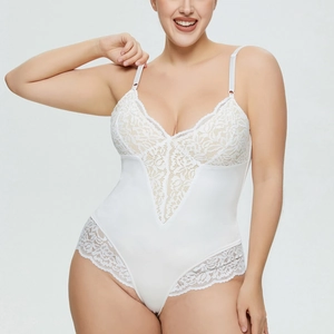 Detailed view of white floral lace stitching on deep V-neck bodysuit with slim straps