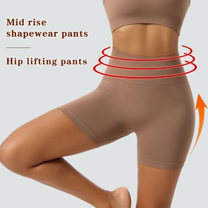 Detailed texture of seamless mid-rise coffee shapewear with tummy control and hip lifting
