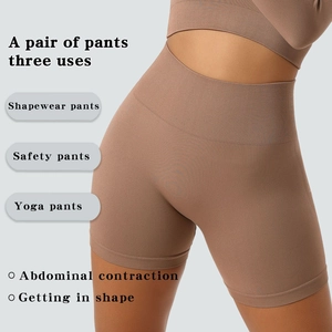 Detail of coffee brown seamless high-waist yoga shorts showing tummy control texture