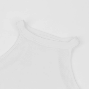 Detailed view of white ribbed knit fabric texture and bound neckline of halter bodysuit