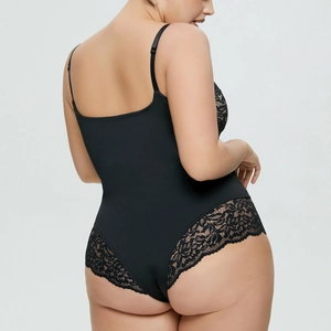 Close-up detail of black lace stitching and floral patterns on the back of the bodysuit