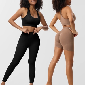 Three-piece seamless ribbed yoga set with high-waist leggings and sports bra in black and beige