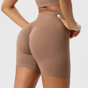 Detail of high waist seamless brown biker shorts with scrunch butt lifting design