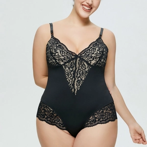 Detail of delicate floral lace on a black deep V-neck bodysuit with adjustable straps